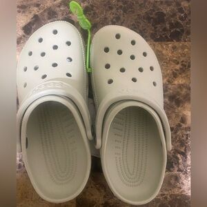 light blue crocs.